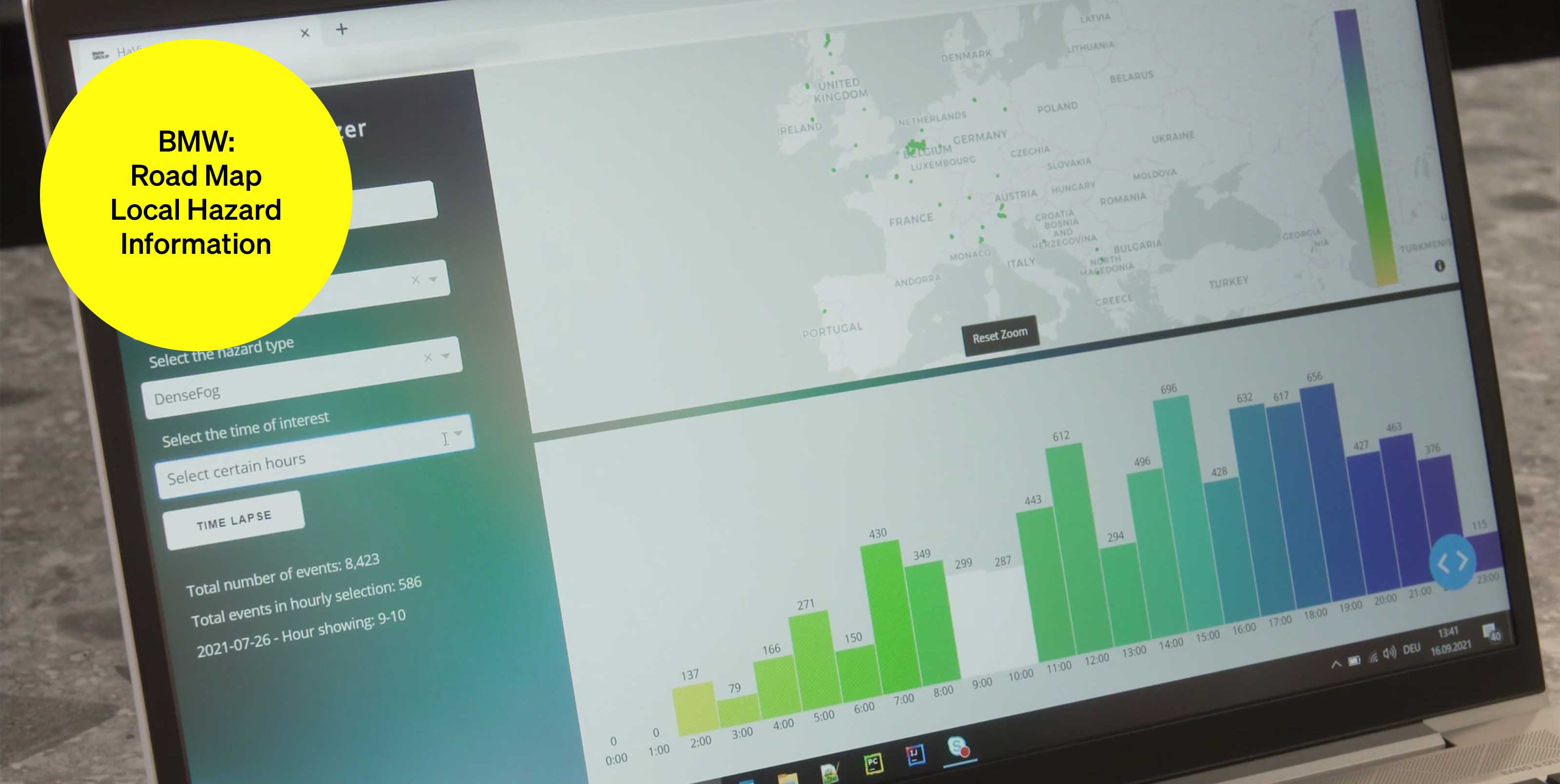 Screen with bar chart and map of Europe - text module in round tile: BMW Road Map Local Hazard Information Screen with bar chart and map of Europe - text module in round tile: BMW Road Map Local Hazard Information