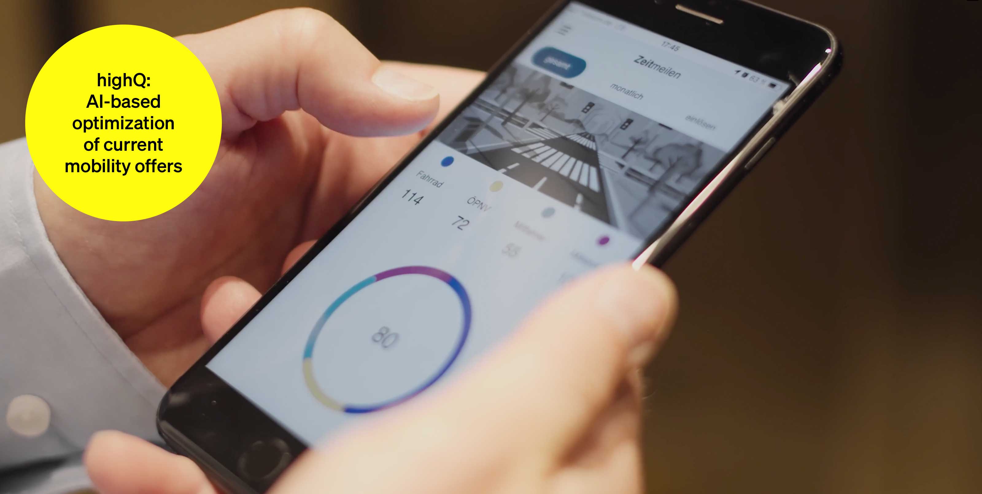 Mobile app with mobility offers - text module in round tile: highQ AI-based optimization of mobility offers. Mobile app with mobility offers - text module in round tile: highQ AI-based optimization of mobility offers.